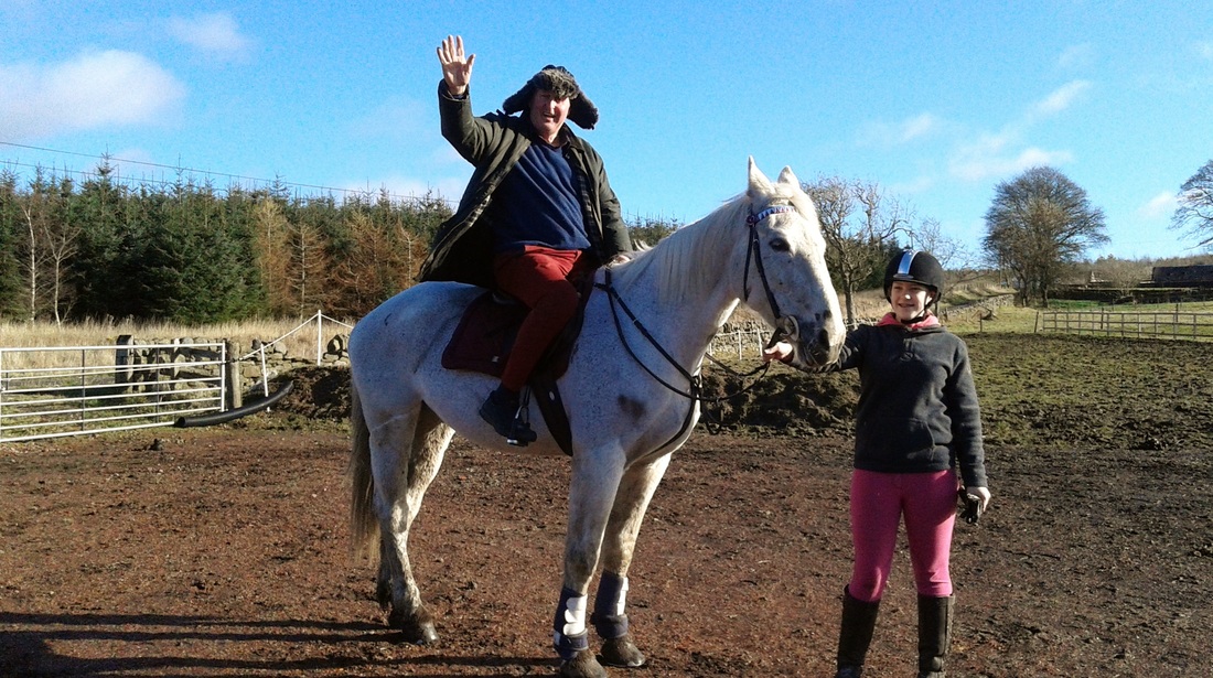 Fraser rides a horse