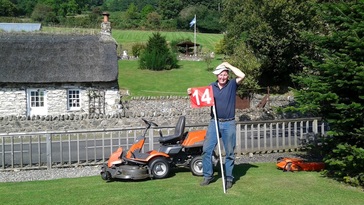 Fraser cutting putting lawn Loch Earn
