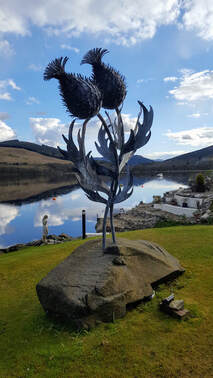 Thistle sculpture by Kev Paxton, Briar Cottages, Loch Earn, Scotland
