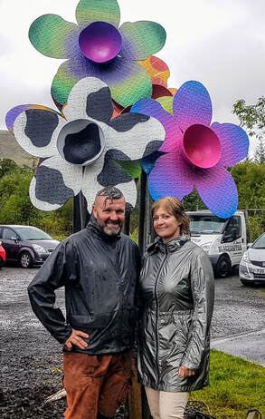 Kim Proven with Kev Paxton and his Weige Weeds sculpture