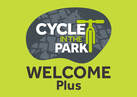 Welcome Plus cycle in the park logo