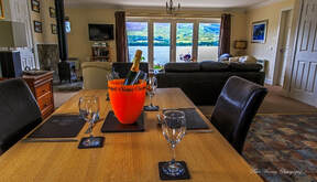 Briar Staading luxury lounge and view of Loch Earn . Short Term Let Licence number £ST00072FsHORT 